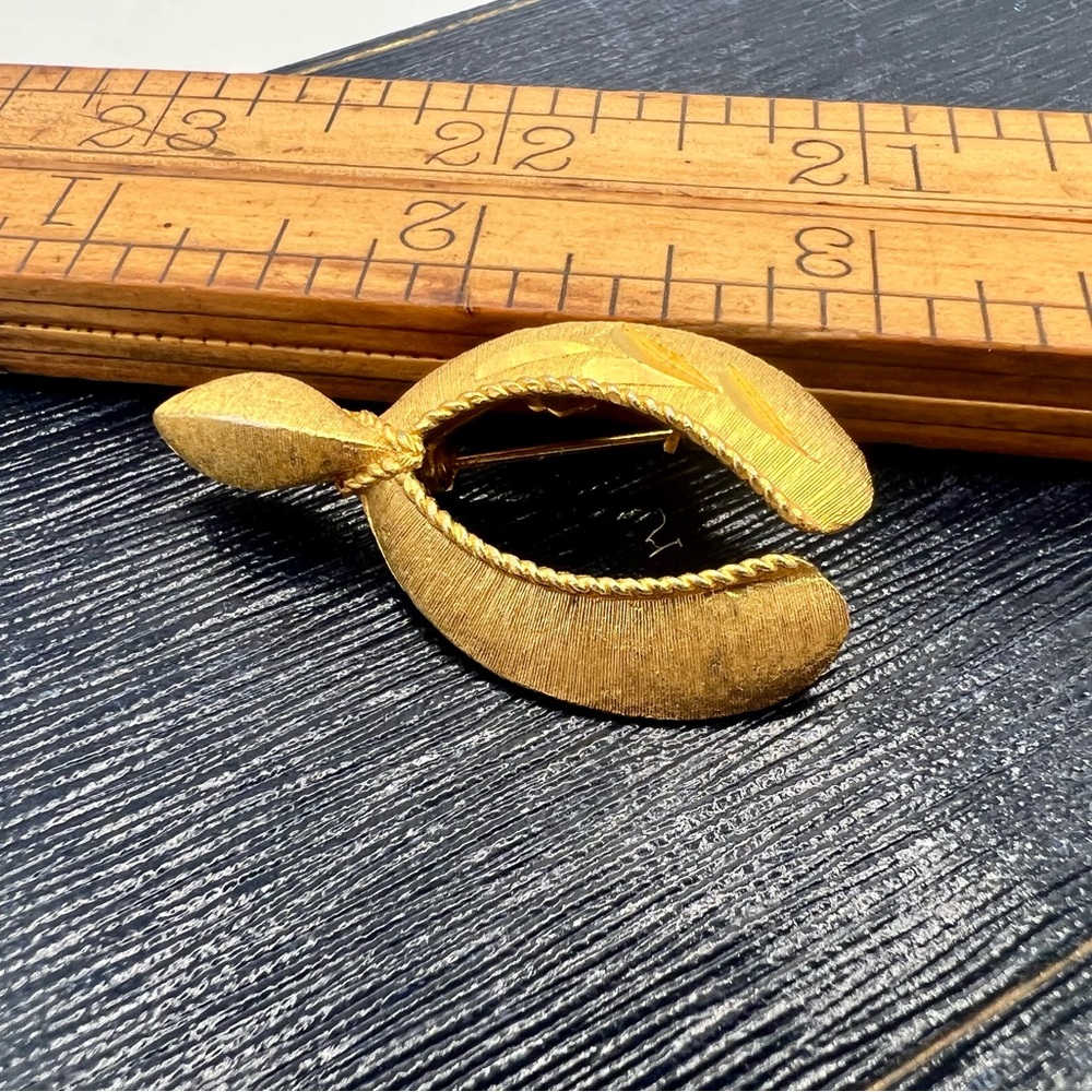Vintage MAMSELLE gold tone wishbone brooch pin